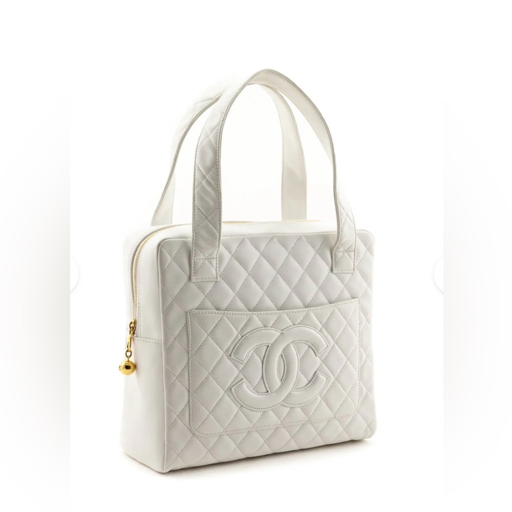 Authentic Chanel calfskin CC tassel handbag